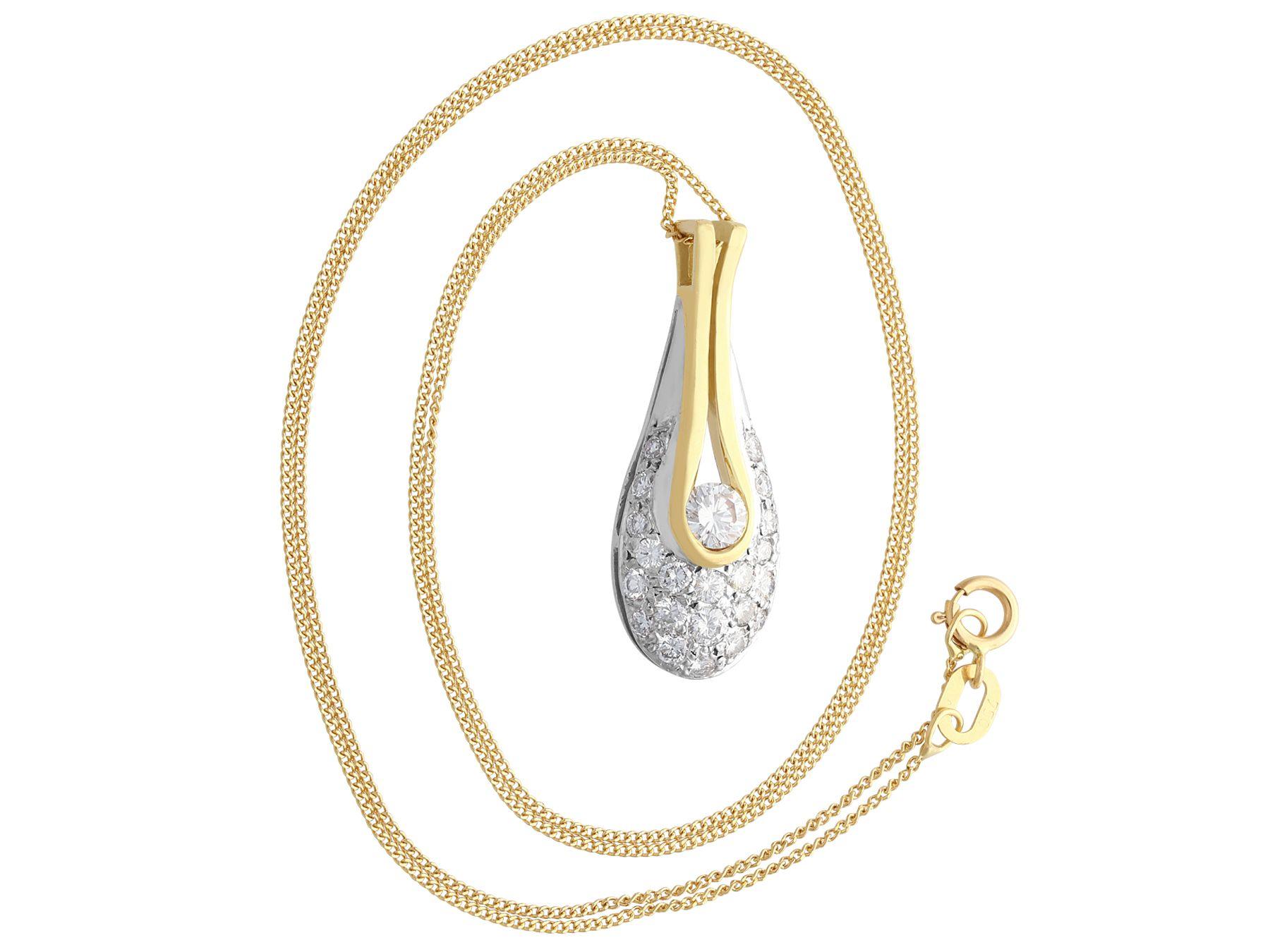 An impressive vintage 0.93 carat diamond, 18 karat yellow gold and 18 karat white gold 'teardrop' pendant; part of our diverse vintage jewelry collections.

This fine and impressive diamond teardrop pendant has been crafted in 18k yellow gold and
