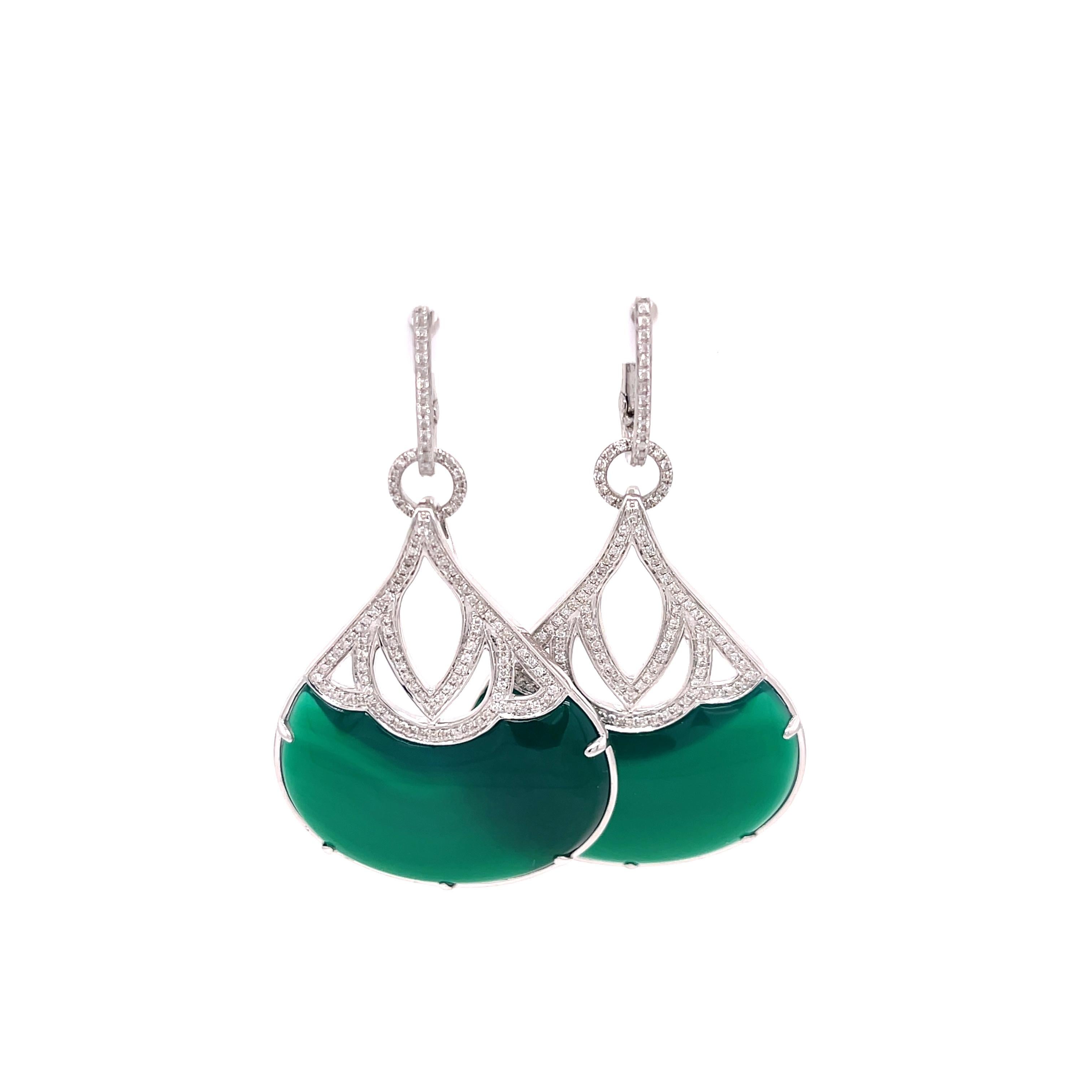 Diamond and green stone dangles in 18K white gold. Stamped 18k 750 A.
