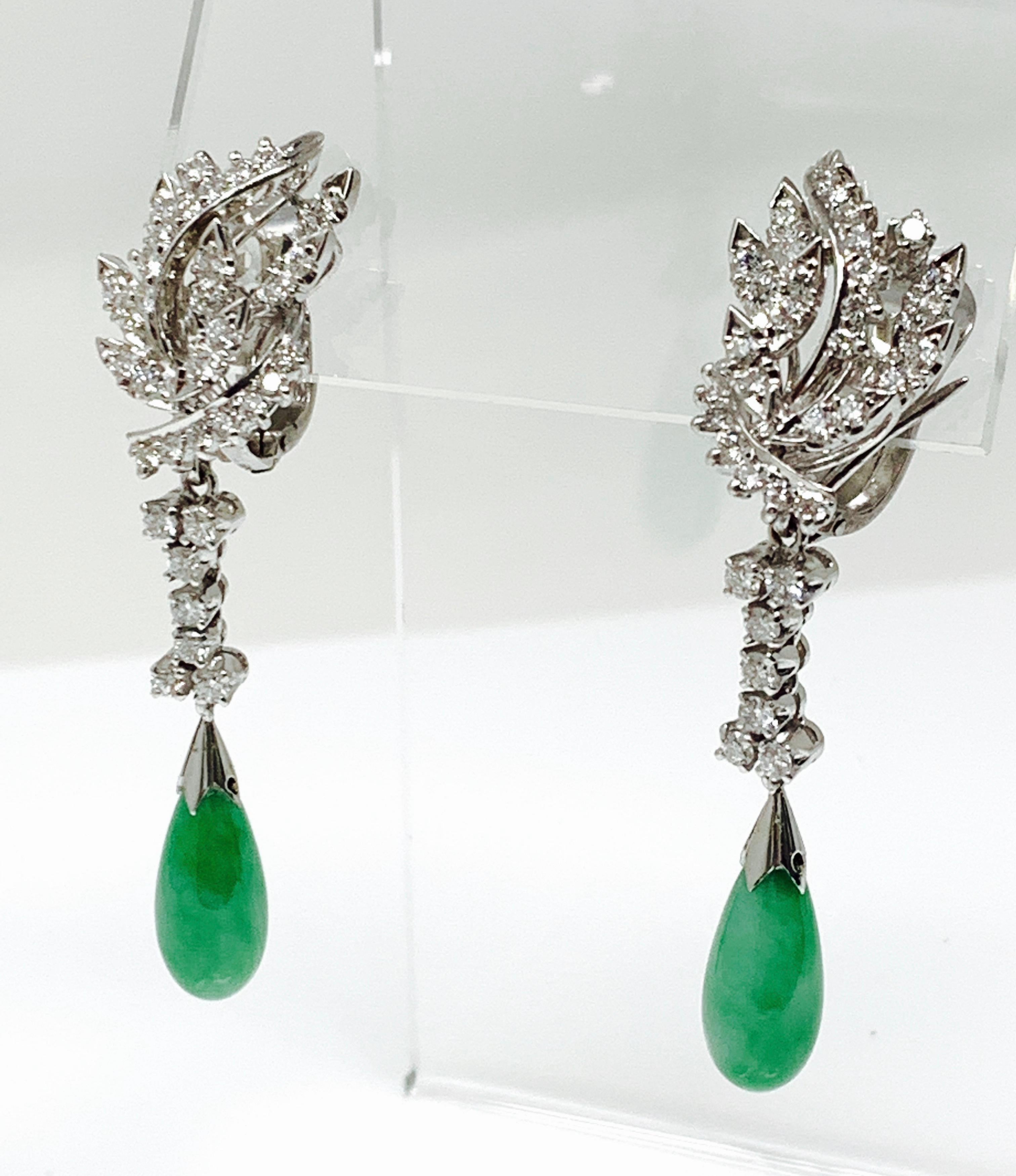Diamond And Jade earrings are beautifully hand crafted in 18 K white gold. 
The details are as follows: 
Diamond weight : 2.50 approx 
Metal : 18 K White Gold 
