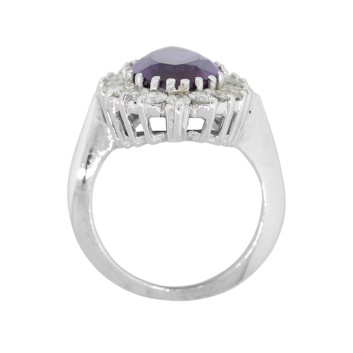Material: 14k White Gold
Diamond Details: Approximately 1.40ctw of round brilliant diamonds. Diamonds are G/H in color and SI in clarity.
Gemstone Details: Marquise shape amethyst measuring approximately 0.69″ x 0.35″
Ring Measurements: 0.97″ x
