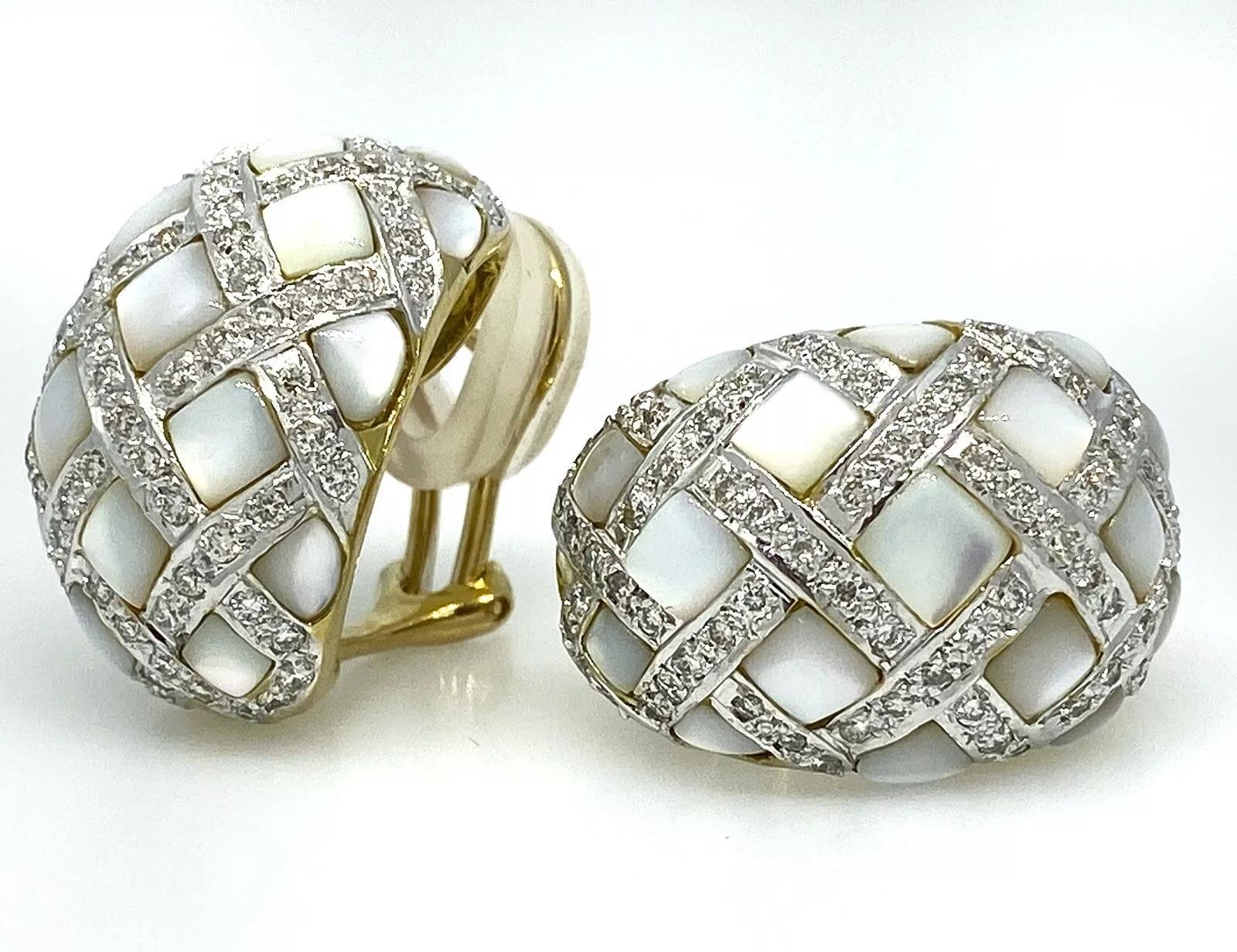 Diamond and Mother-of-Pearl Checkerboard Bombe Earrings in 18k White Gold

Mother-of-Pearl and Diamond Earrings feature Square sections of Mother-of-Pearl separated by rows of Round Brilliant Diamonds in a checkerboard pattern, all set in 18k Yellow