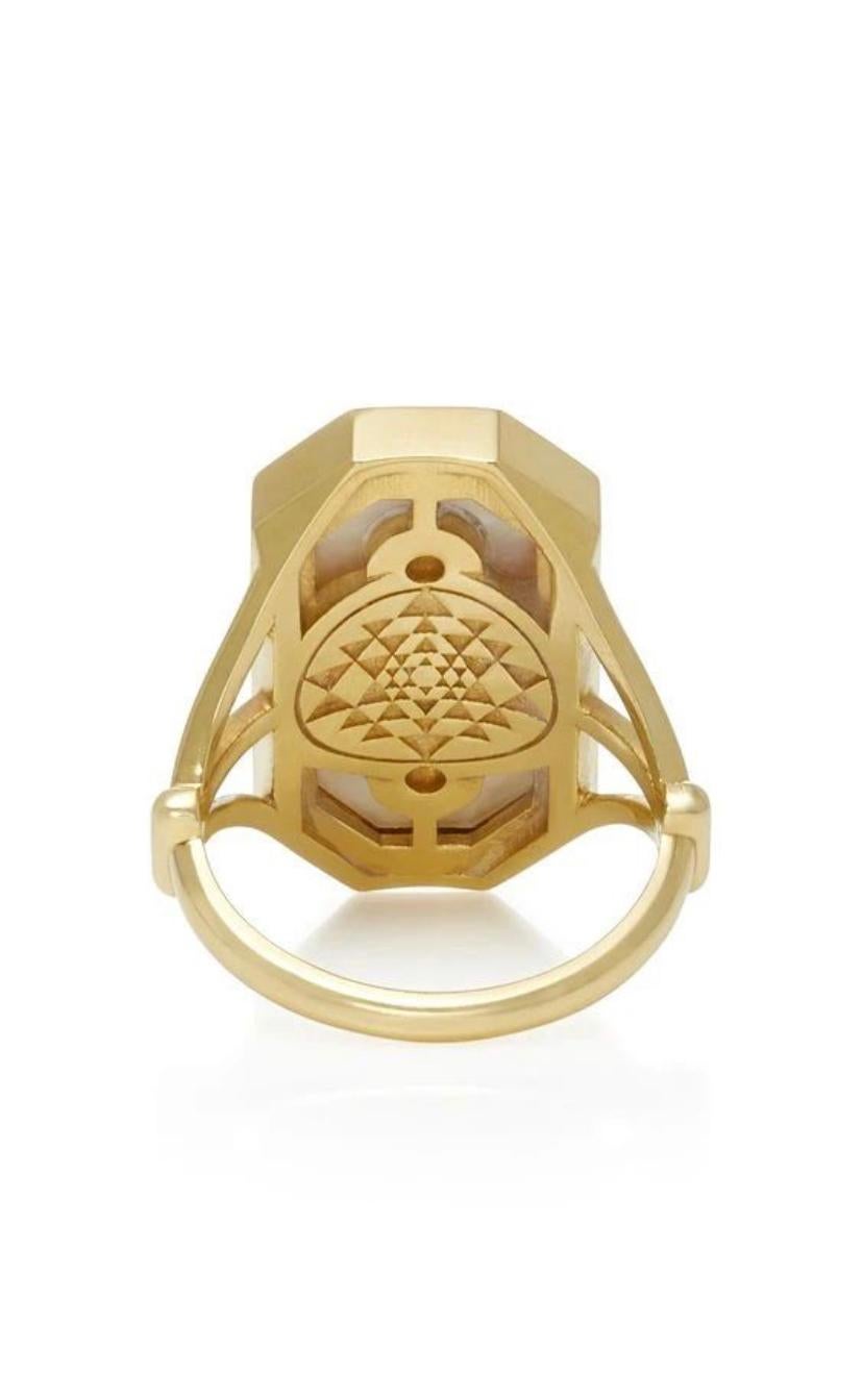 This 18 Karat Yellow Gold Ring was inspired by Victorian period jewelry and pairs well with both old and contemporary pieces. It has White Mother of Pearl inlay that is surrounded by 0.4 Carats of White Diamond micro pave.  This Ring also has a Sri