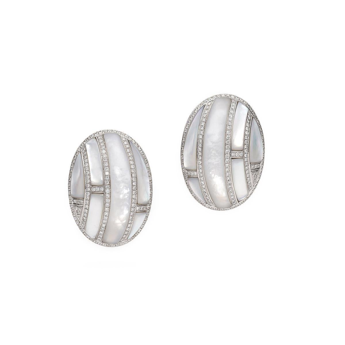 Earrings in 18kt white gold set with 306 diamonds 2.14 cts and 12 mother of pearls 12.75 cts