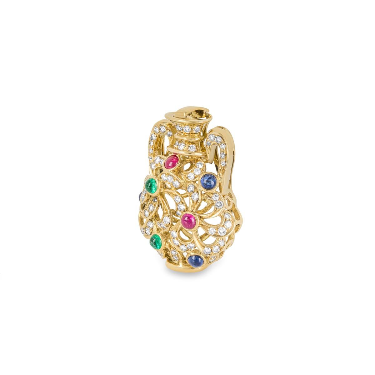 An alluring 18k yellow gold diamond and multi-gem pendant. The openwork vase shape pendant consists of diamonds, sapphires, rubies and tourmalines. The pendant has 66 round brilliant cut diamonds, totalling approximately 1.32ct. The sapphires,