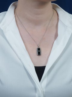 Geometrischer Anhänger im Art-Déco-Stil aus schwarzem Onyx und Diamanten, aus 9-karätigem Weißgold