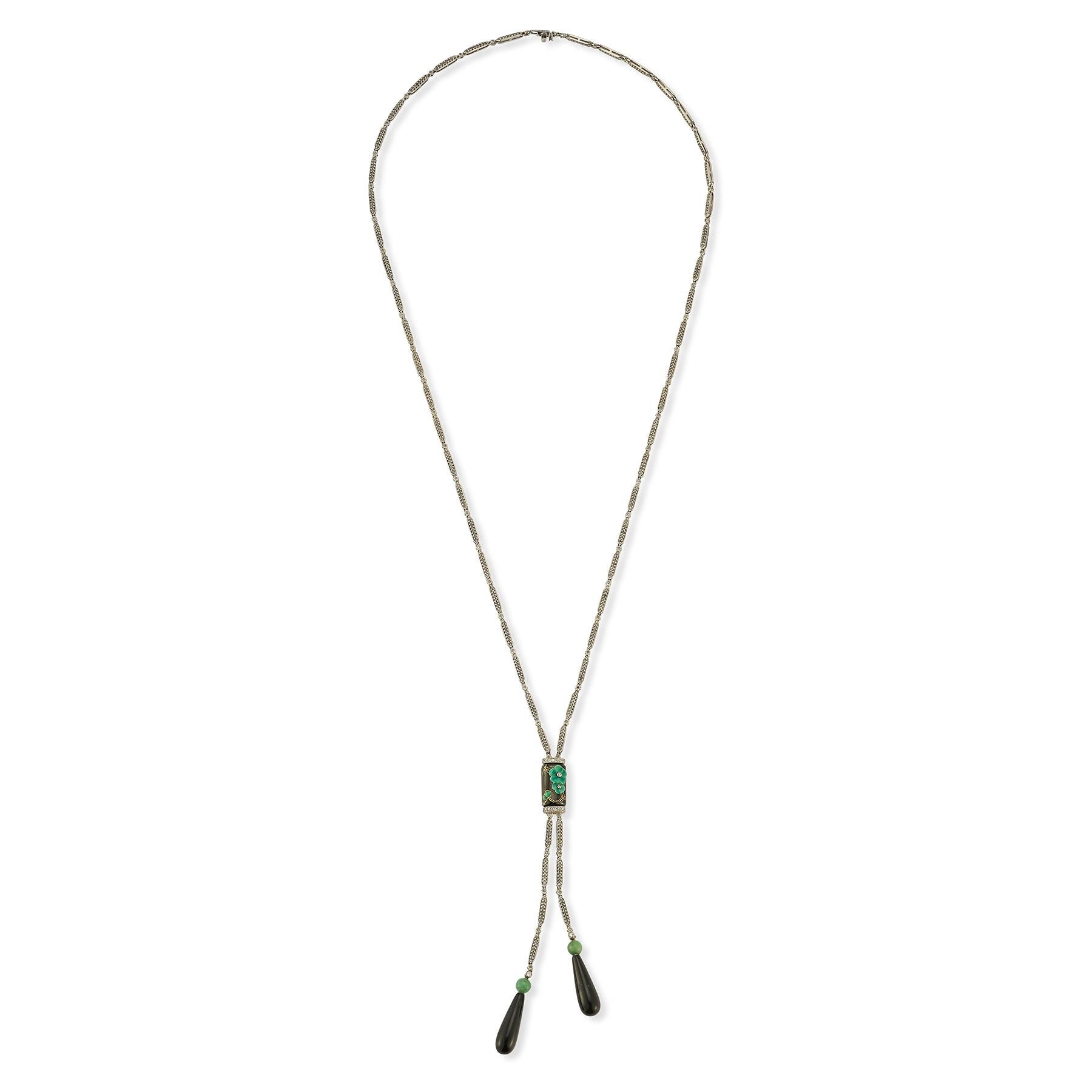 Diamond & Onyx Drop Link Necklace set in 18K white gold, including 2 pear shape onyx drops & 2 Jade beads
Circa 1935
Diamond Weight: 3.80 Cts 
Necklace Measurements: 26