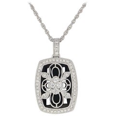 Diamond and Onyx Flower Pendant Necklace, 14 Karat White Gold .38 Carat