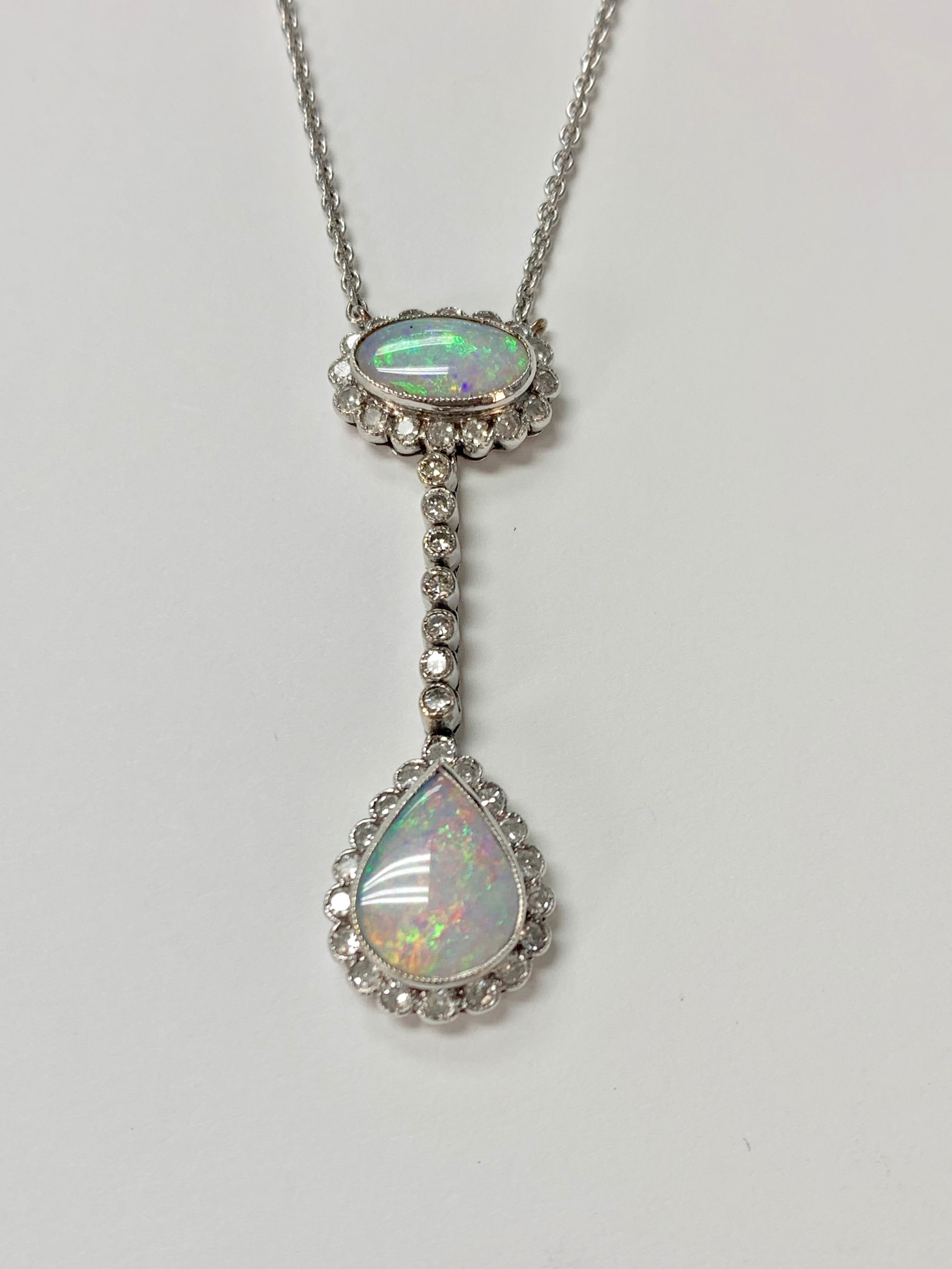 Very pretty diamond and opal necklace handcrafted in 18k white gold. 
The details are as follows : 
Diamond weight : 1 carat approx ( GH color and VS SI clarity ) 
Opal weight : 3.75 carat 
Measurements : Length : 1 3/4 inches 
