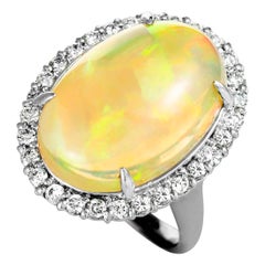 Diamond and Opal Oval Platinum Ring