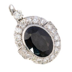 Diamond and Oval Sapphire Halo Drop Earrings