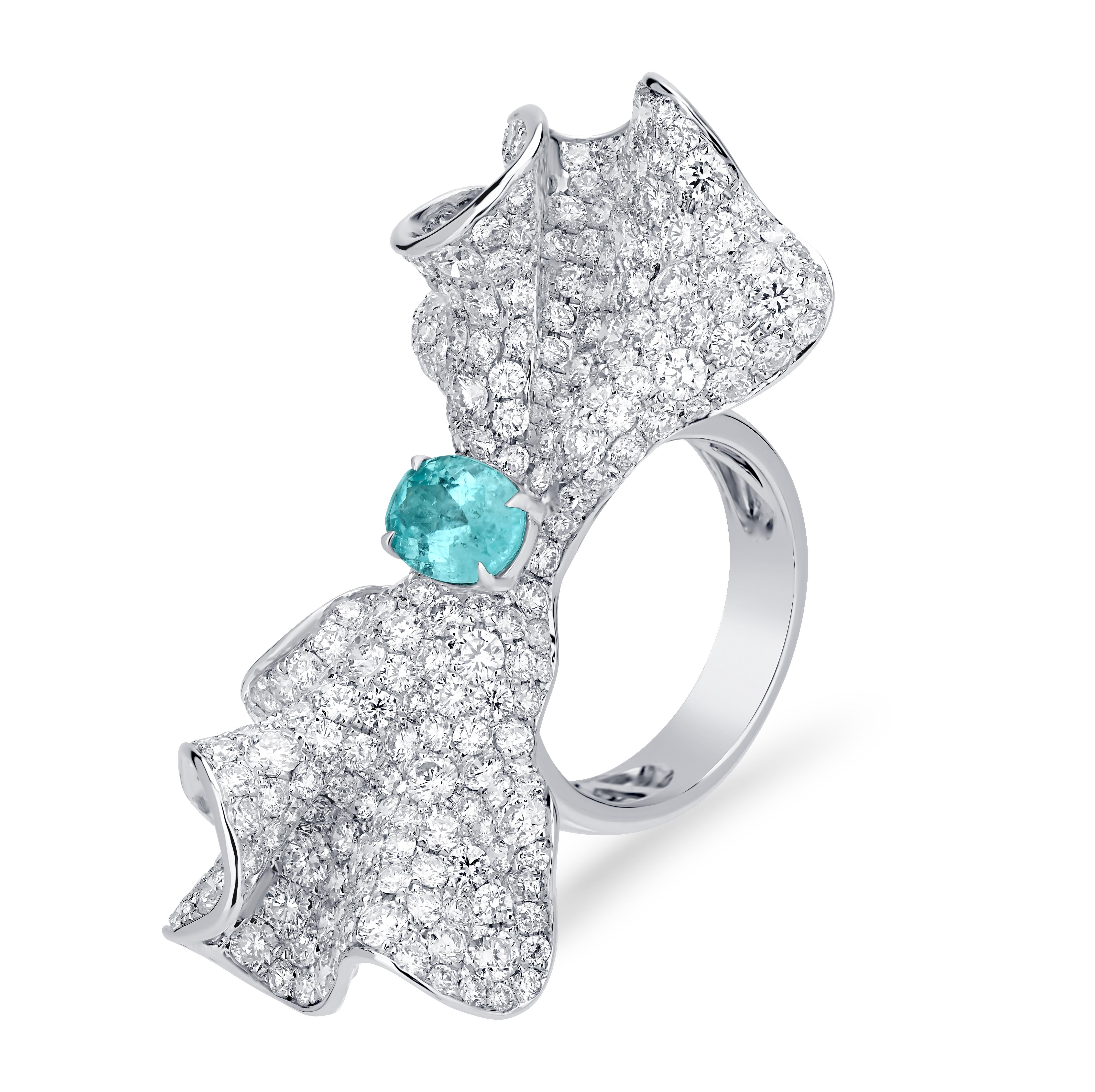 You'll adore wearing this adorable 1.11 Cts Paraiba ring with a bow motif. Embedded with 6.58 Cts diamonds, this ring is a reflection of all the sparkle and style you've imagined. The diamonds are G-H grade in color and SI1 in clarity.

JEWELRY