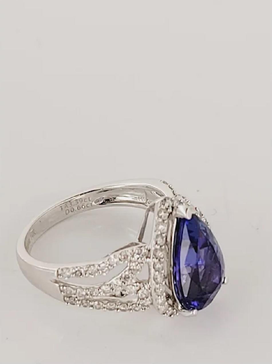 Diamond and Pear Cut Genuine Tanzanite 3.5 carats Ring set in 14K White Gold In New Condition For Sale In New York, NY