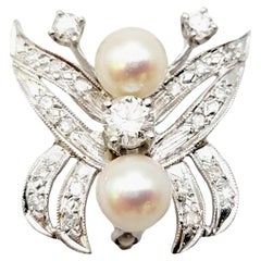 Rehausseur / Pendentif papillon en or blanc 14 carats avec diamants et perles 
