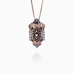 Pendentif/broche convertible en or rose et argent, diamant et perle, 0,77 carat
