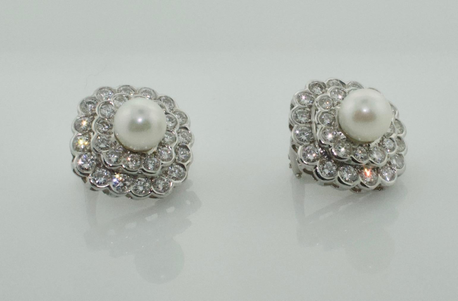 Diamond and Pearl Earrings in Platinum Circa 1950's
Thirty Two Round Brilliant Cut Diamonds weighing 2.60 carats approximately [GH VVS- SI1]
Thirty Two Round Brilliant Cut Diamonds weighing 1.10 carats approximately [GH VVS- SI1]
Two Round Cultured