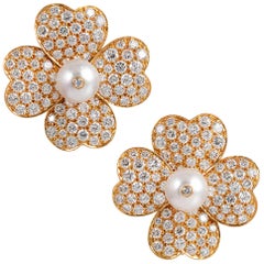 Used Diamond and Pearl Flower Earrings, Signed “Van Cleef & Arpels”