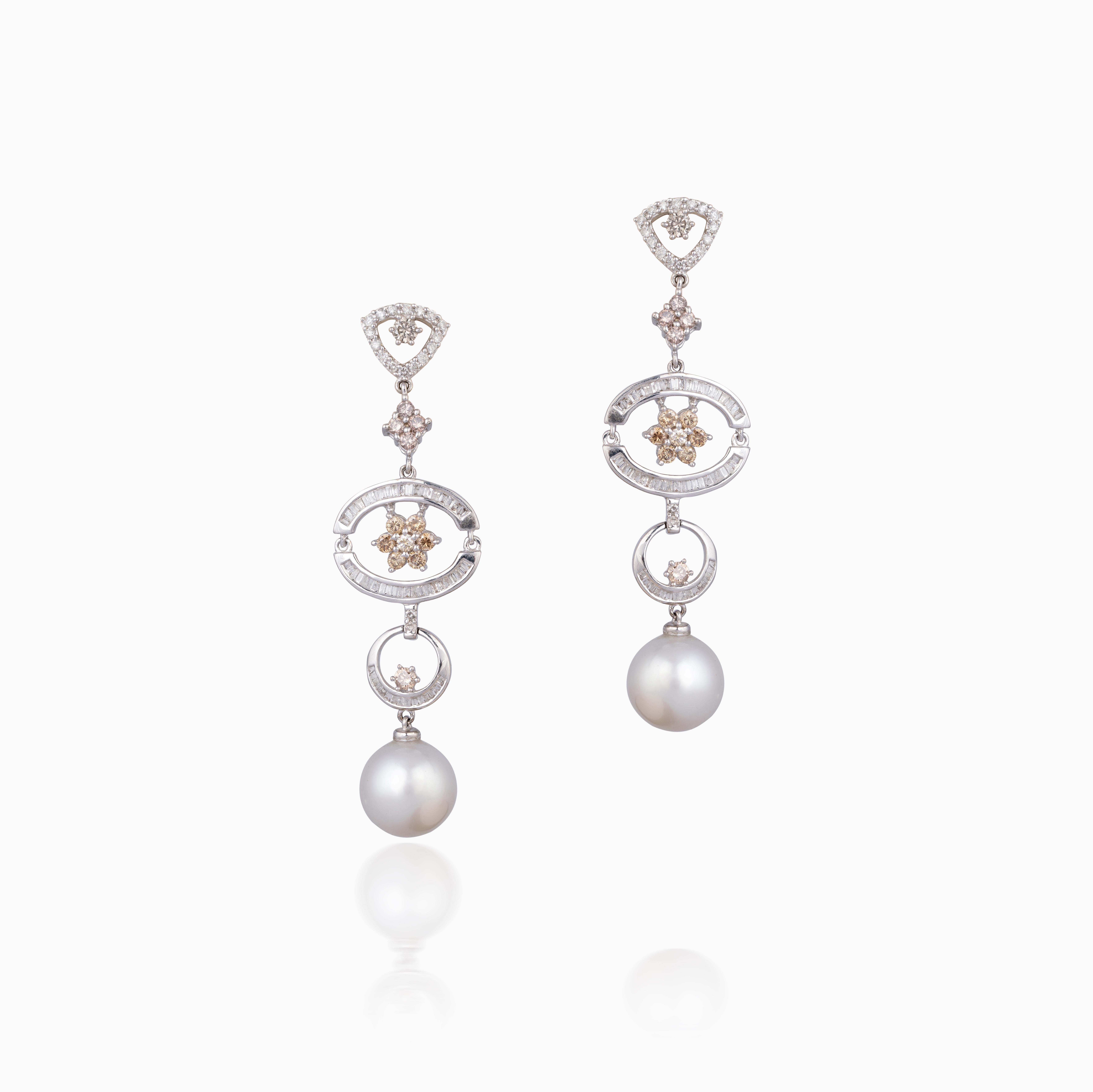 (Diamond 2.05 cts) and (pearl 20.30cts) (gold earring 18k nw 8.700gm)