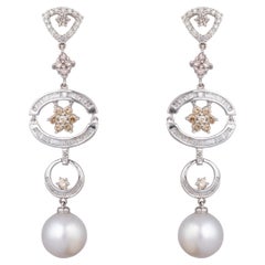 18k gold 2.05cts Diamond and 20.30cts Pearl Earring
