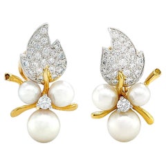 Boucles d'oreilles clips en or jaune 18 carats, diamant et perle blanche en forme de feuille