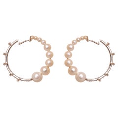 Anneaux orbitaux en diamant et perle en or 18kt, diamant et perles