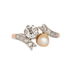 Diamond and Pearl Rose Gold Platinum Engagement Ring