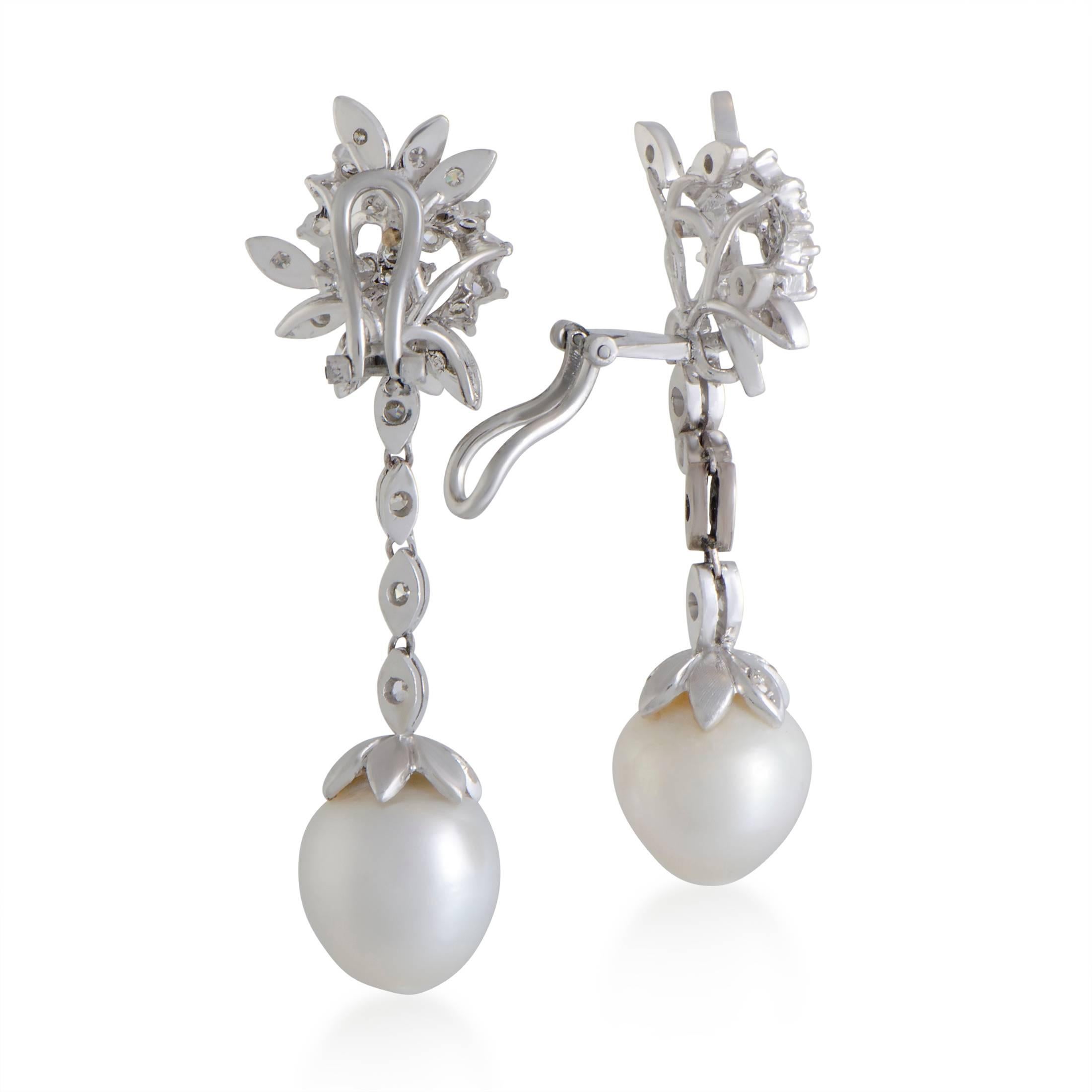 Splendidly feminine and incredibly classy, these gorgeous earrings feature elegant design and sophisticated décor. The earrings are made of 18K white gold and embellished with sublime pearls and 0.65 carats of glistening diamonds.
