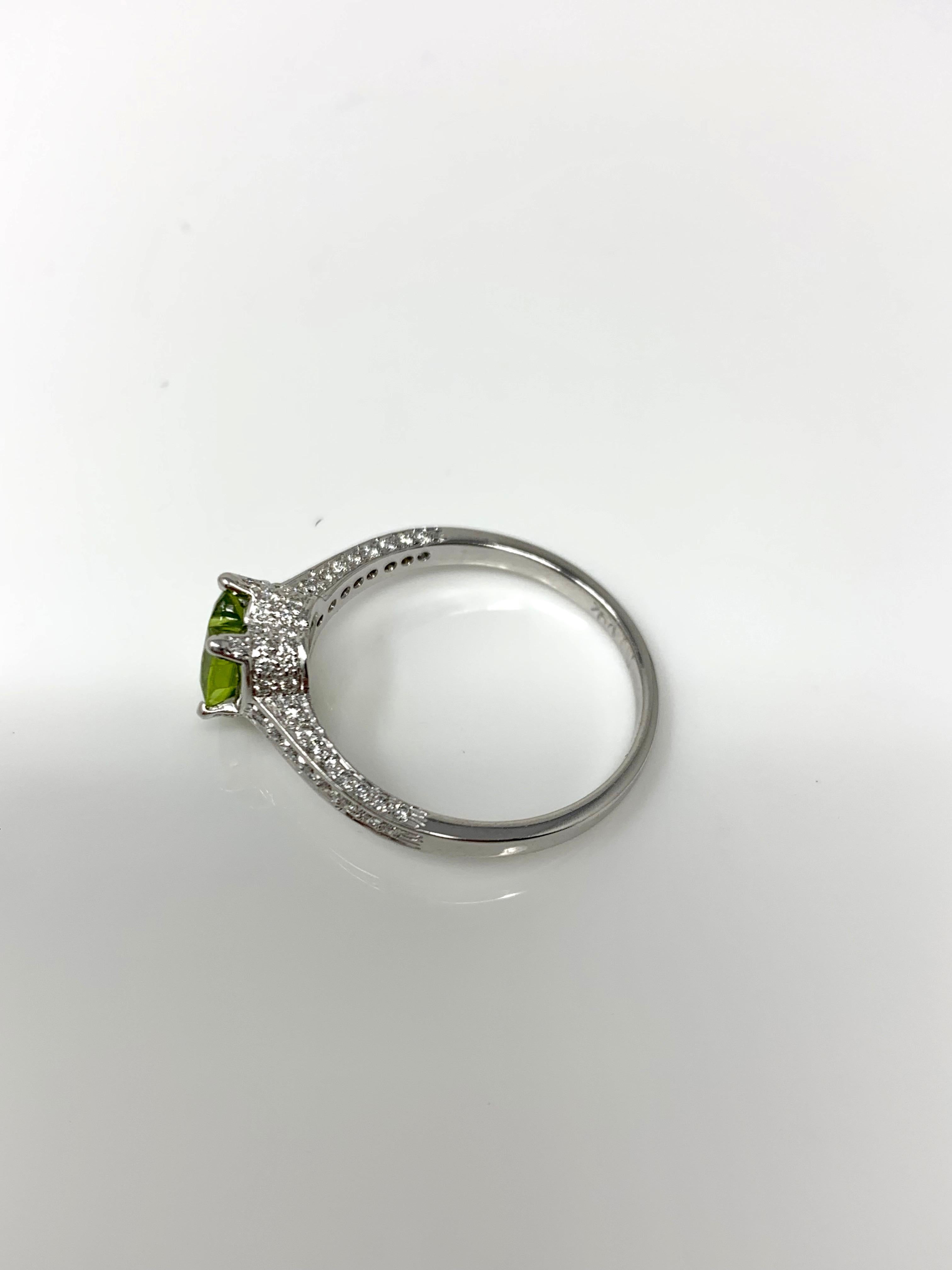 Diamond and Peridot Engagement Ring in 18 Karat White Gold For Sale 2