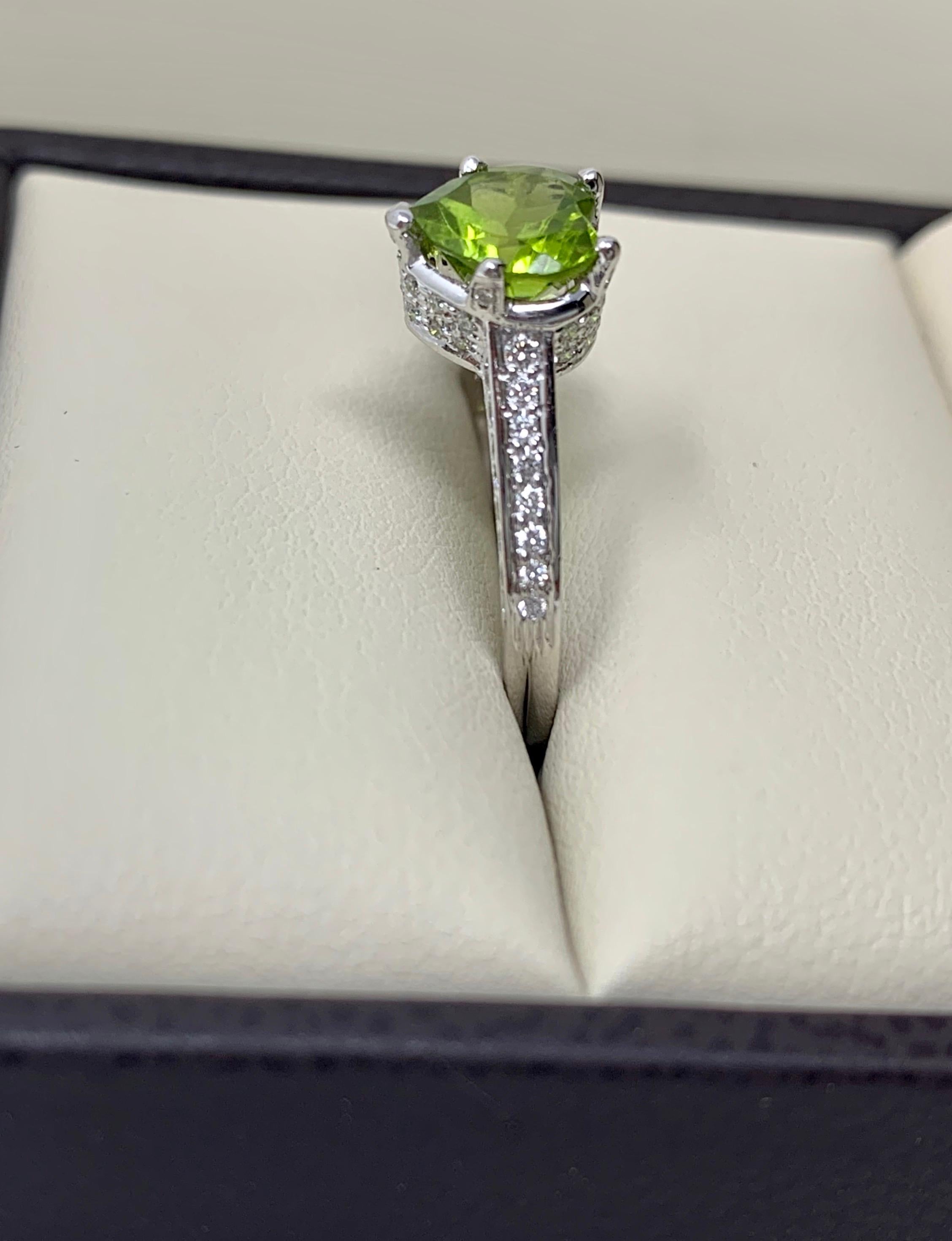 Diamond and Peridot Engagement Ring in 18 Karat White Gold For Sale 4