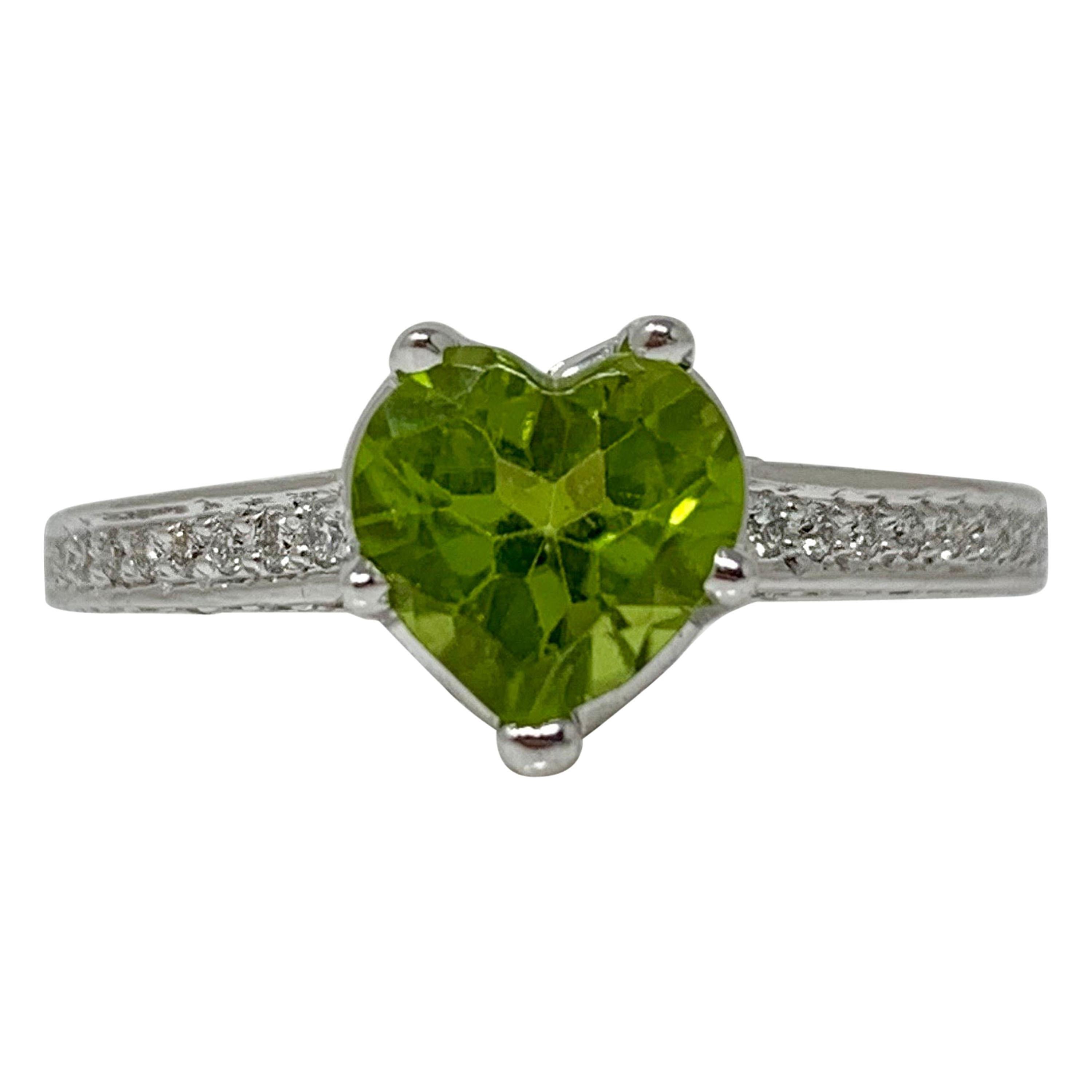 Diamond and Peridot Engagement Ring in 18 Karat White Gold For Sale