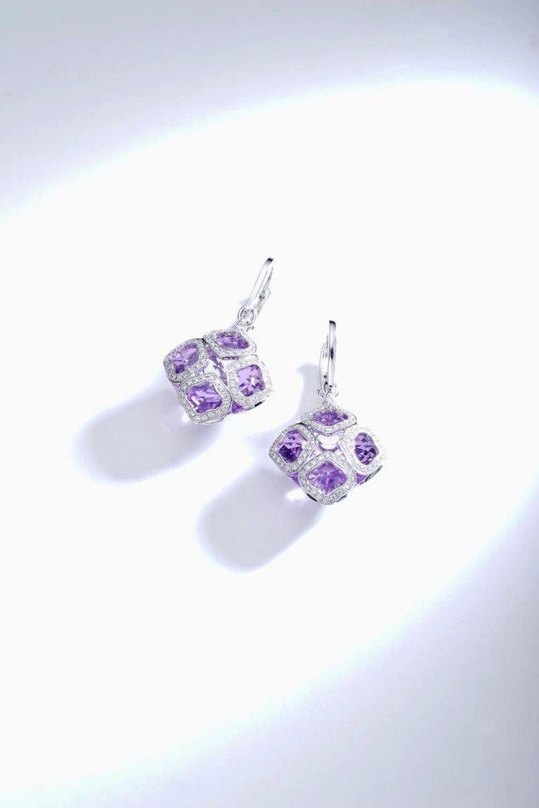 Chopard Imperiale Amethyst and Diamond on white Gold 18k Earrings.
Chopard signed and numbered.
Total height: 1.57 inch (4.00 centimeters).

Pave Diamonds: 0.63 carat.
With 2 Faceted Amethysts Centers: 11.60 carat.

Contemporary work. Imperiale