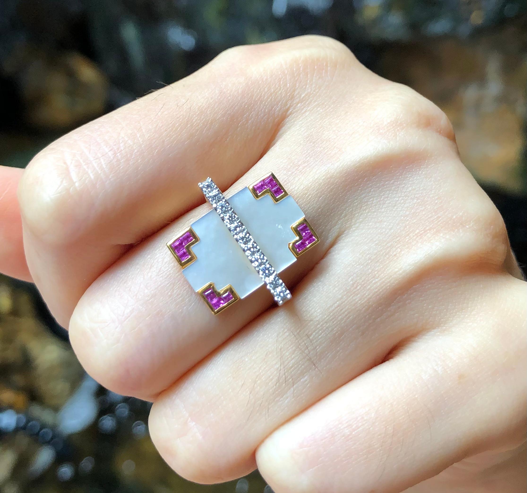 Diamond 0.29 carat and Pink Sapphire 0.56 carat Ring set in 18 Karat Gold Settings

Width:  2.0 cm 
Length:  1.8 cm
Ring Size: 52
Total Weight: 6.37 grams

