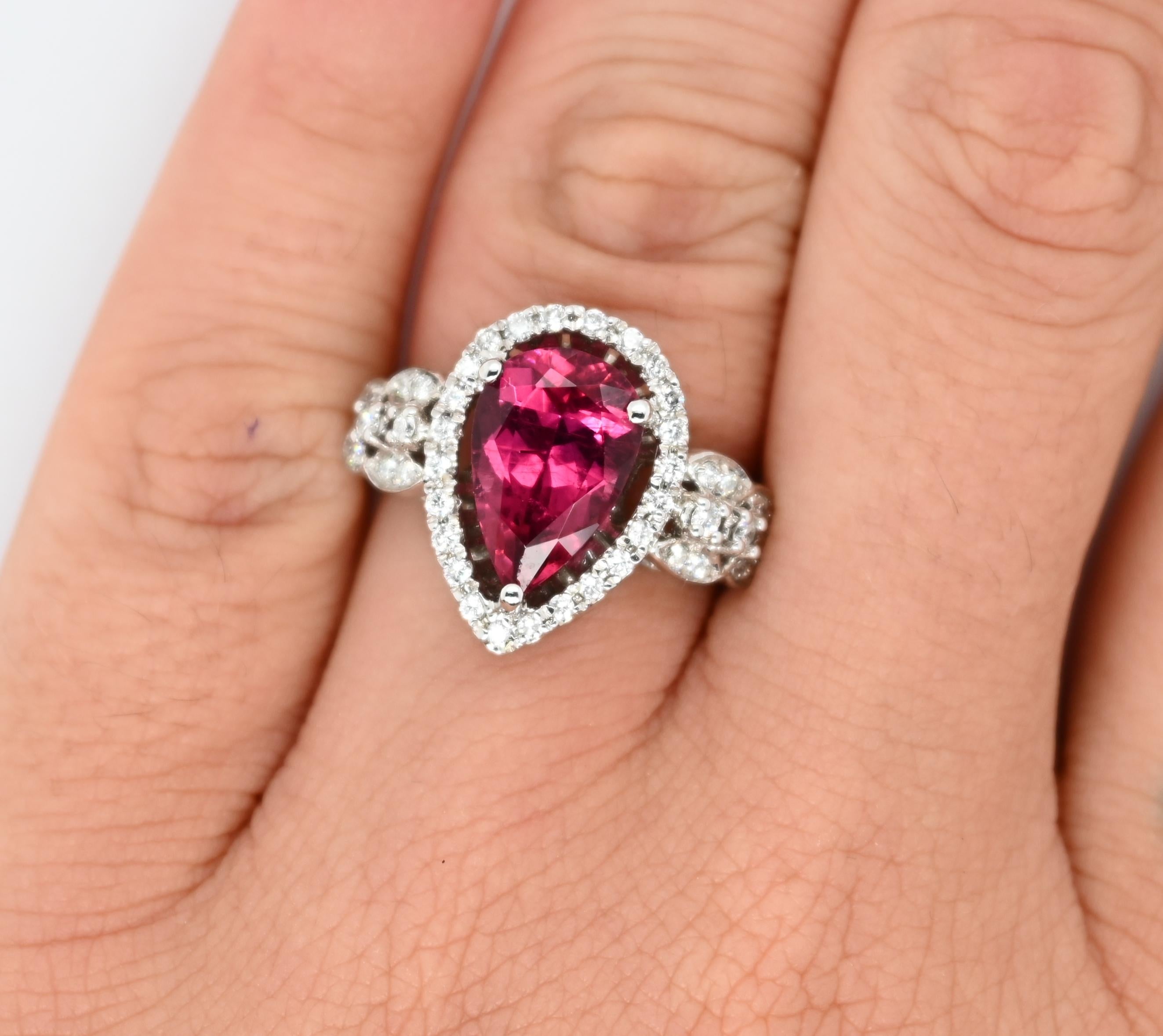Features 0.93 carats of white diamonds and 3.28 carats of pink tourmaline. 