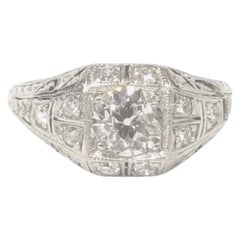 Bague Art déco en platine et diamants, avec diamants de 1 carat et centre de 0,56 carat