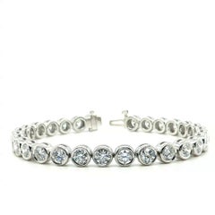 Diamond and Platinum Bezel Tennis Bracelet, 6.96 Carats Total, 6.25 Inches