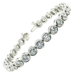 Diamond and Platinum Bezel Tennis Bracelet, 6.96 Carats Total, 6.25 Inches