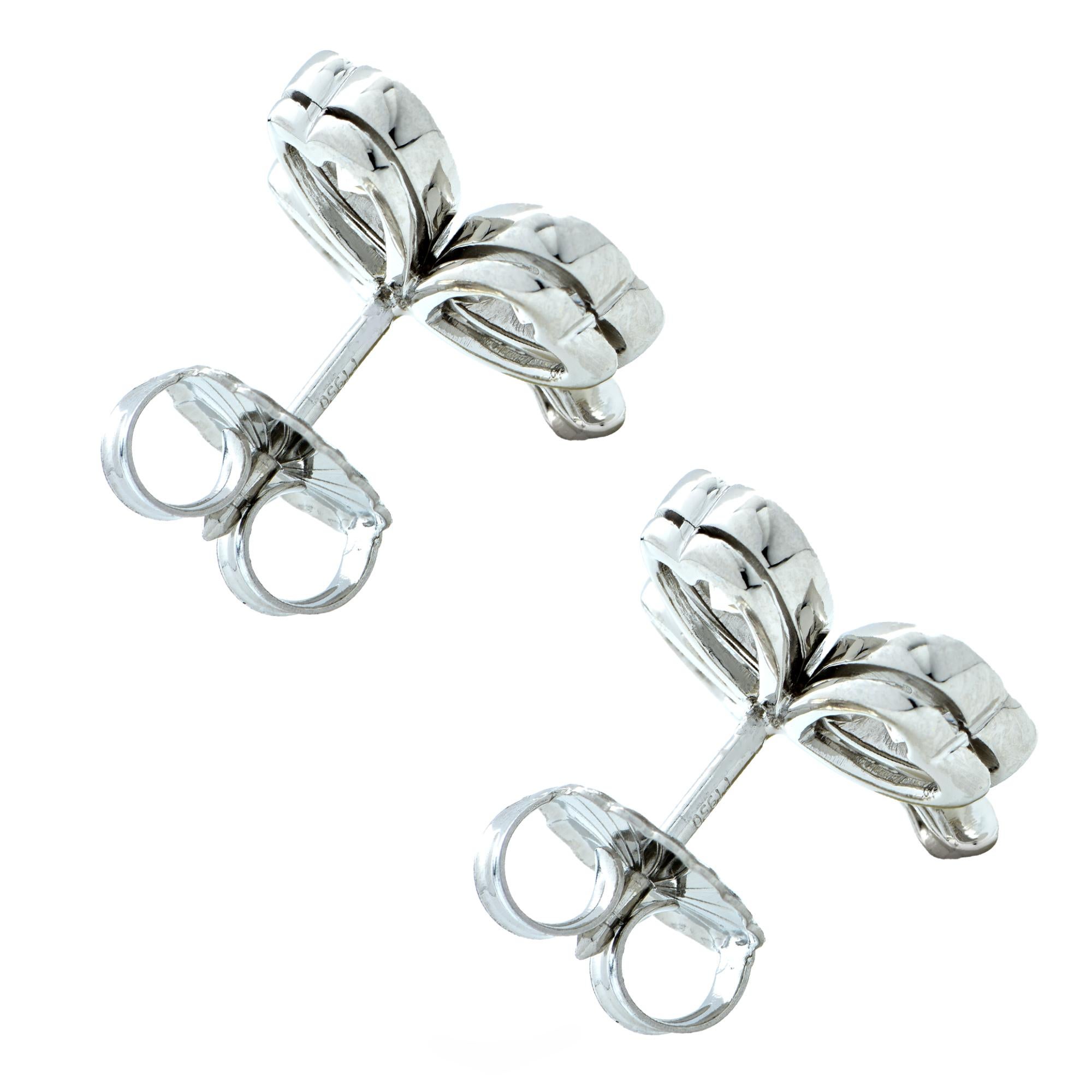 Delightful earrings crafted in platinum featuring 6 round brilliant cut diamonds weighing approximately 3 carats, F color VS clarity, and 10 round brilliant cut diamonds weighing approximately .50 carats F color VS clarity. These gorgeous bright