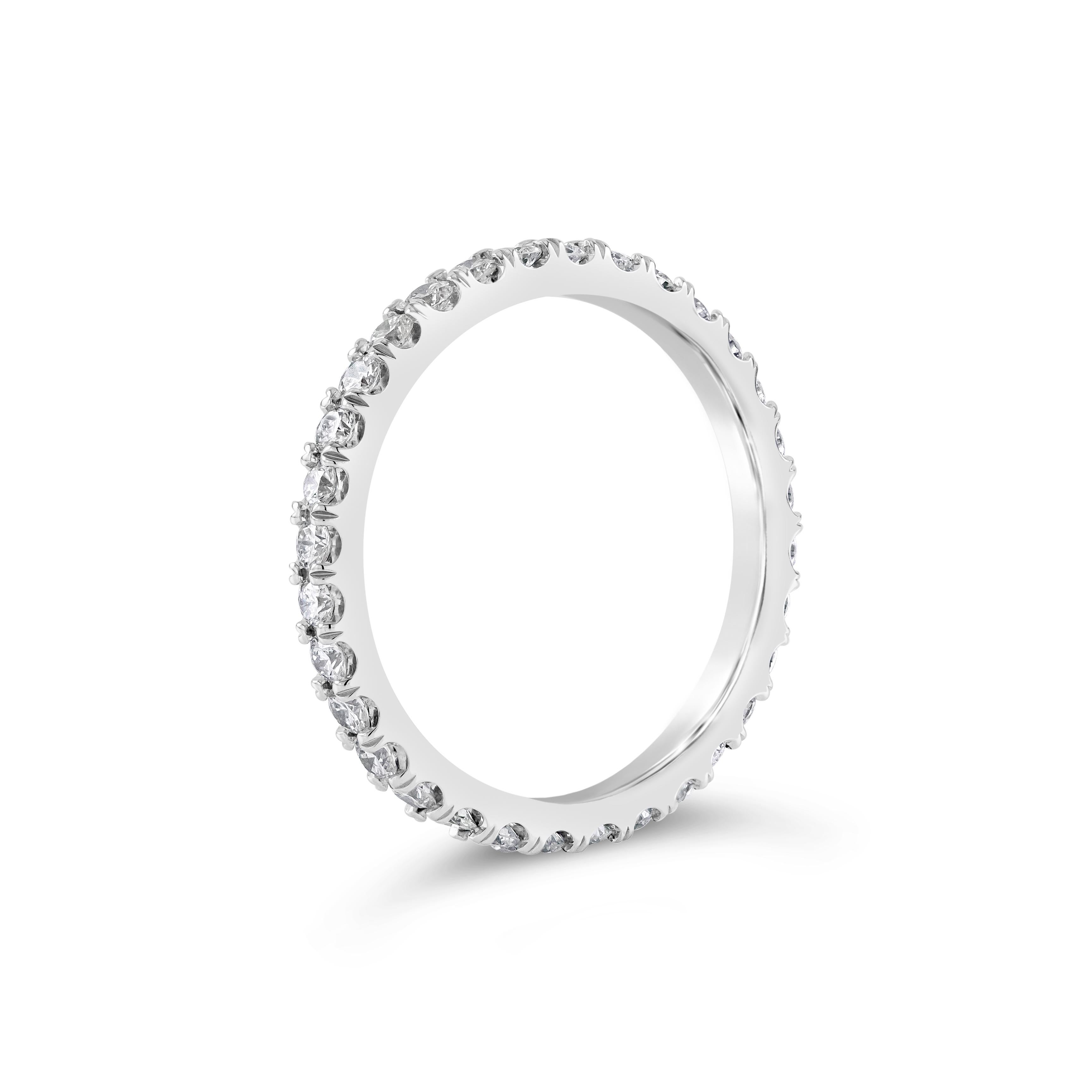 This simple eternity wedding ring features 0.67 total carats of 32 round brilliant diamonds in eternity setting. Made with Platinum. Size 6 US.

Roman Malakov is a custom house, specializing in creating anything you can imagine. If you would like to