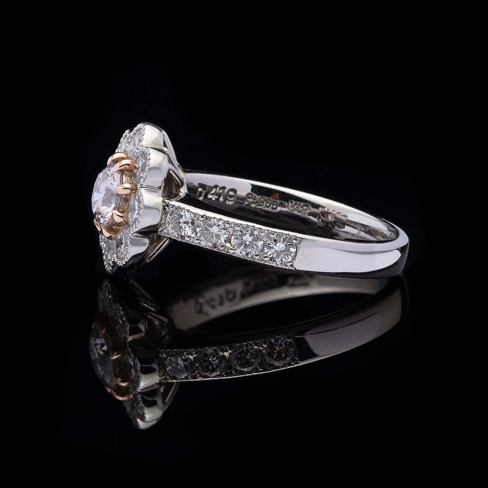 Round Cut Diamond and Platinum Flower Ring For Sale