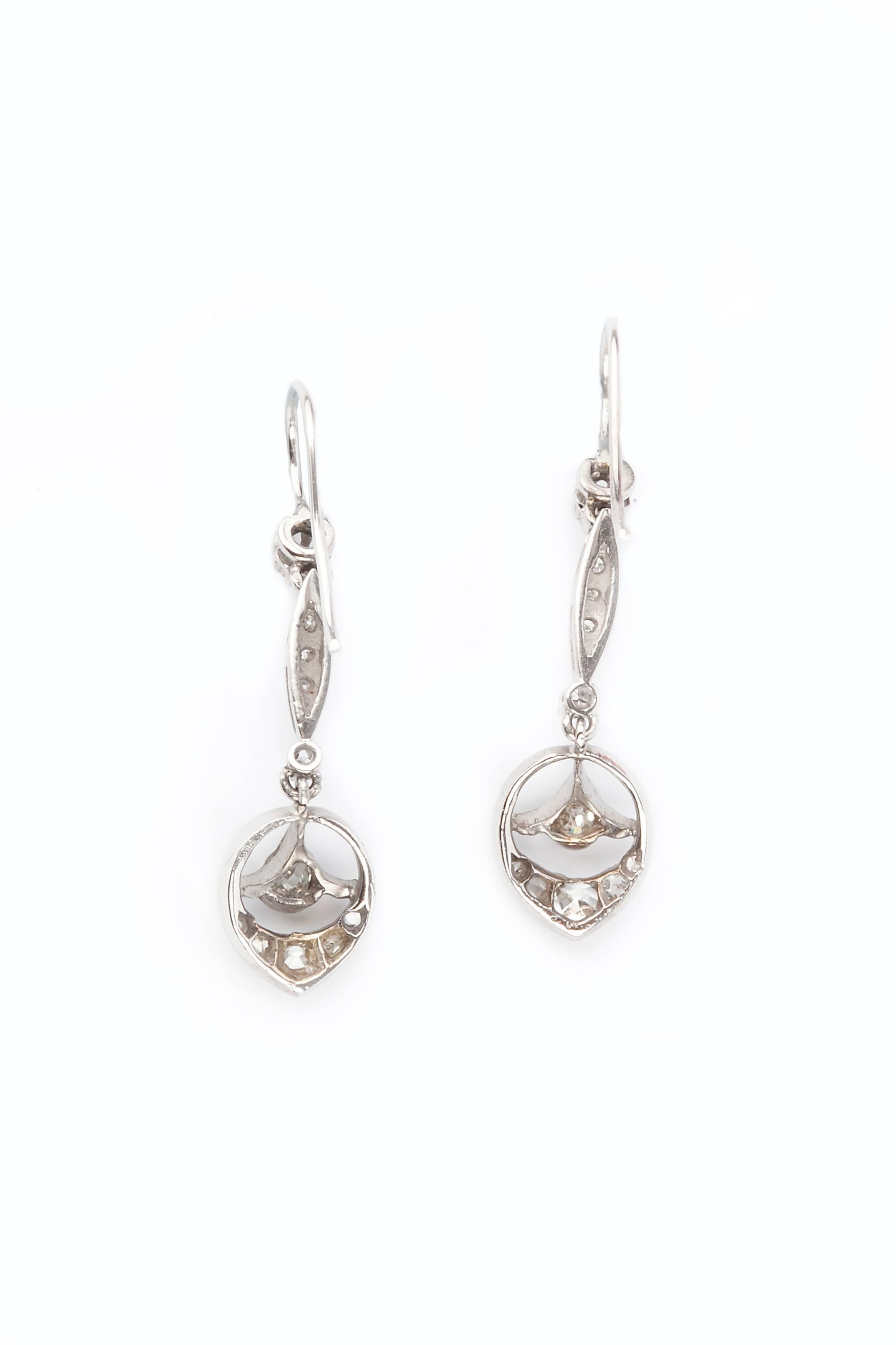 A pair of delicate rose cut diamond set Edwardian earrings, very elegant and set in a milgrain setting. A very elegant original pair.