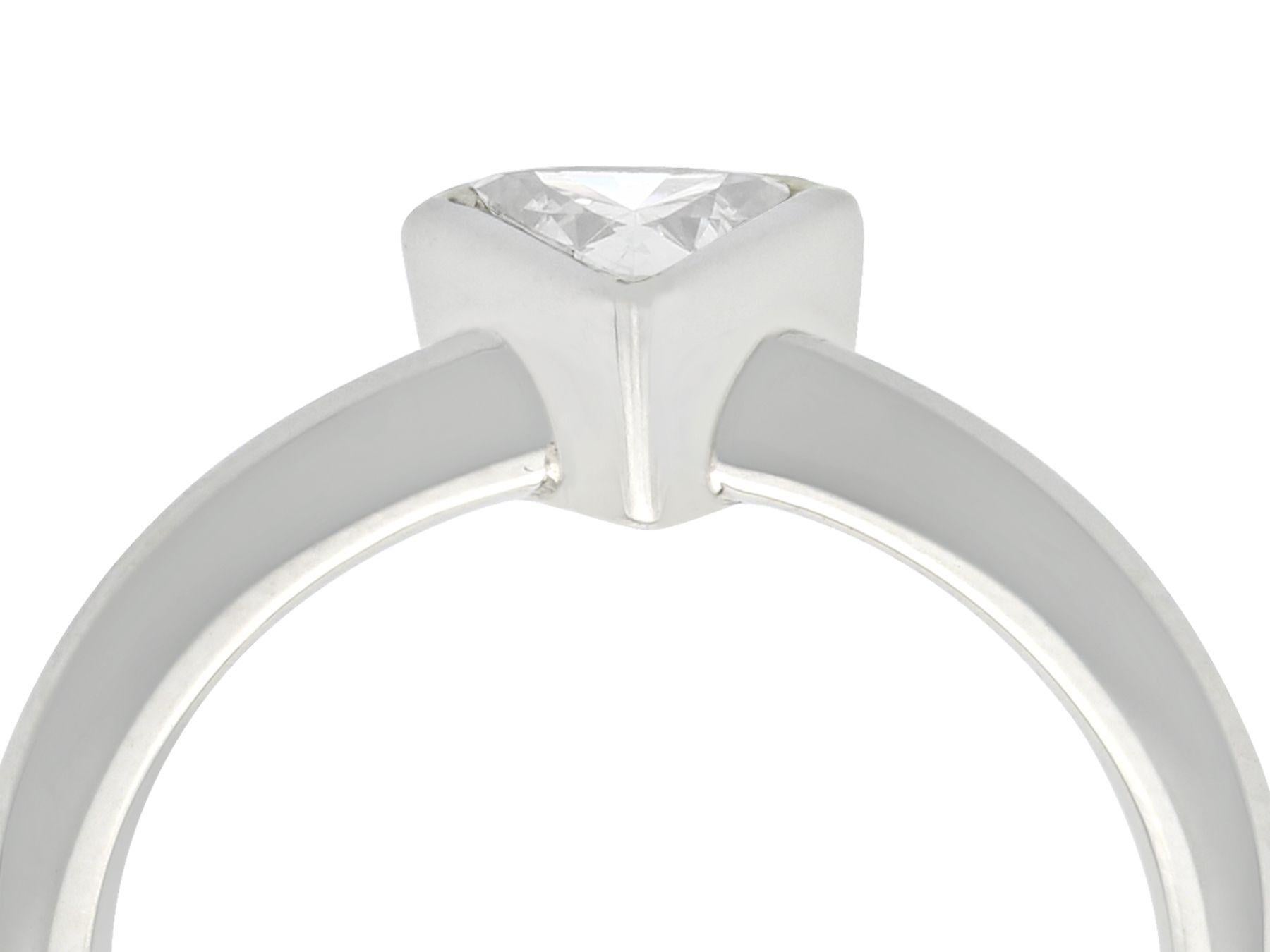 A fine 0.31 carat trillion cut diamond and platinum solitaire ring; part of our diverse diamond jewelry and estate jewelry collections

This fine trillion solitaire ring has been crafted in platinum

The 0.31Ct trillion cut diamond is bezel set