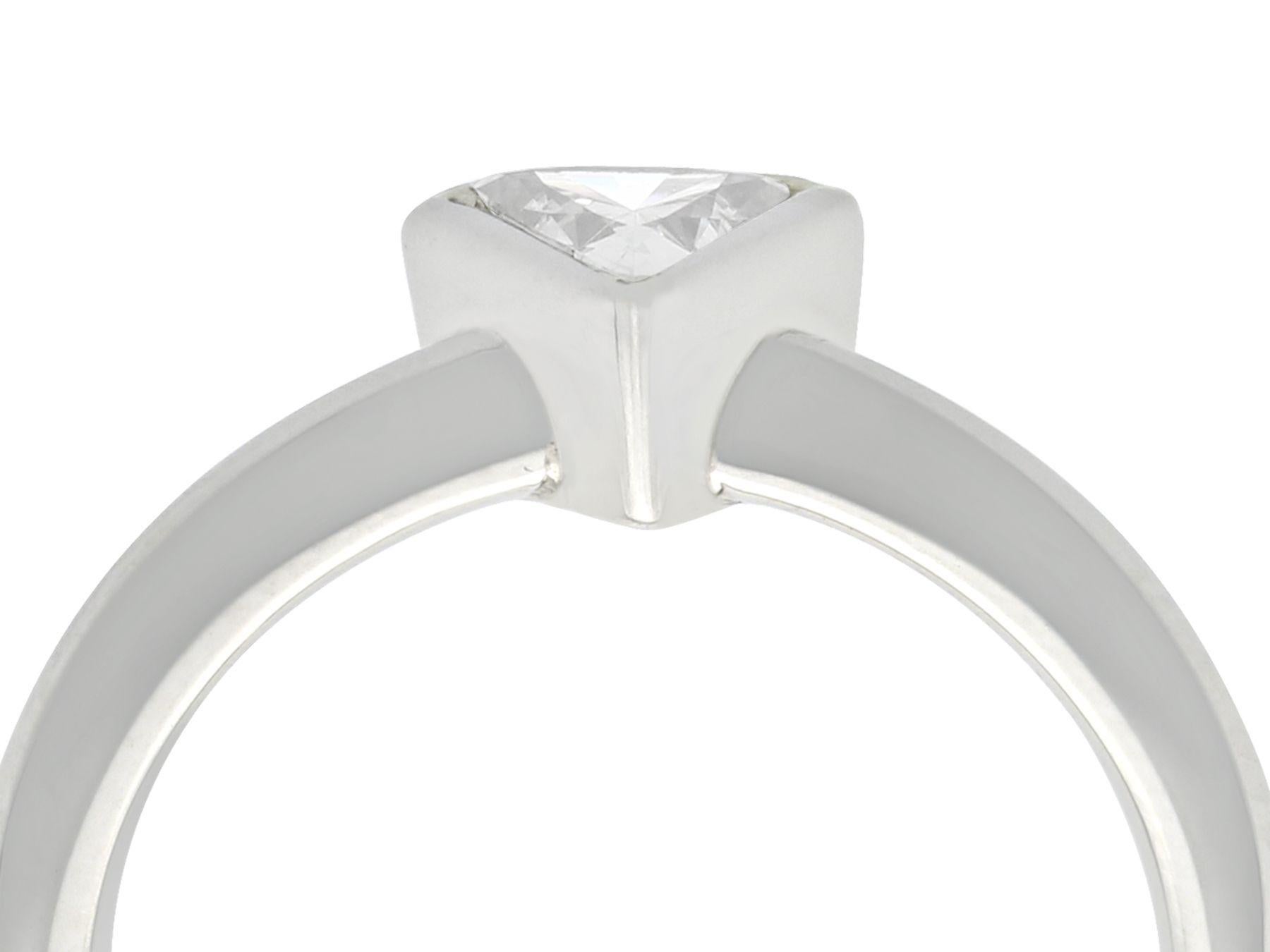 A fine 0.31 carat trillion cut diamond and platinum solitaire ring; part of our diverse diamond jewelry and estate jewelry collections.

This fine trillion solitaire ring has been crafted in platinum

The 0.31Ct trillion cut diamond is bezel set