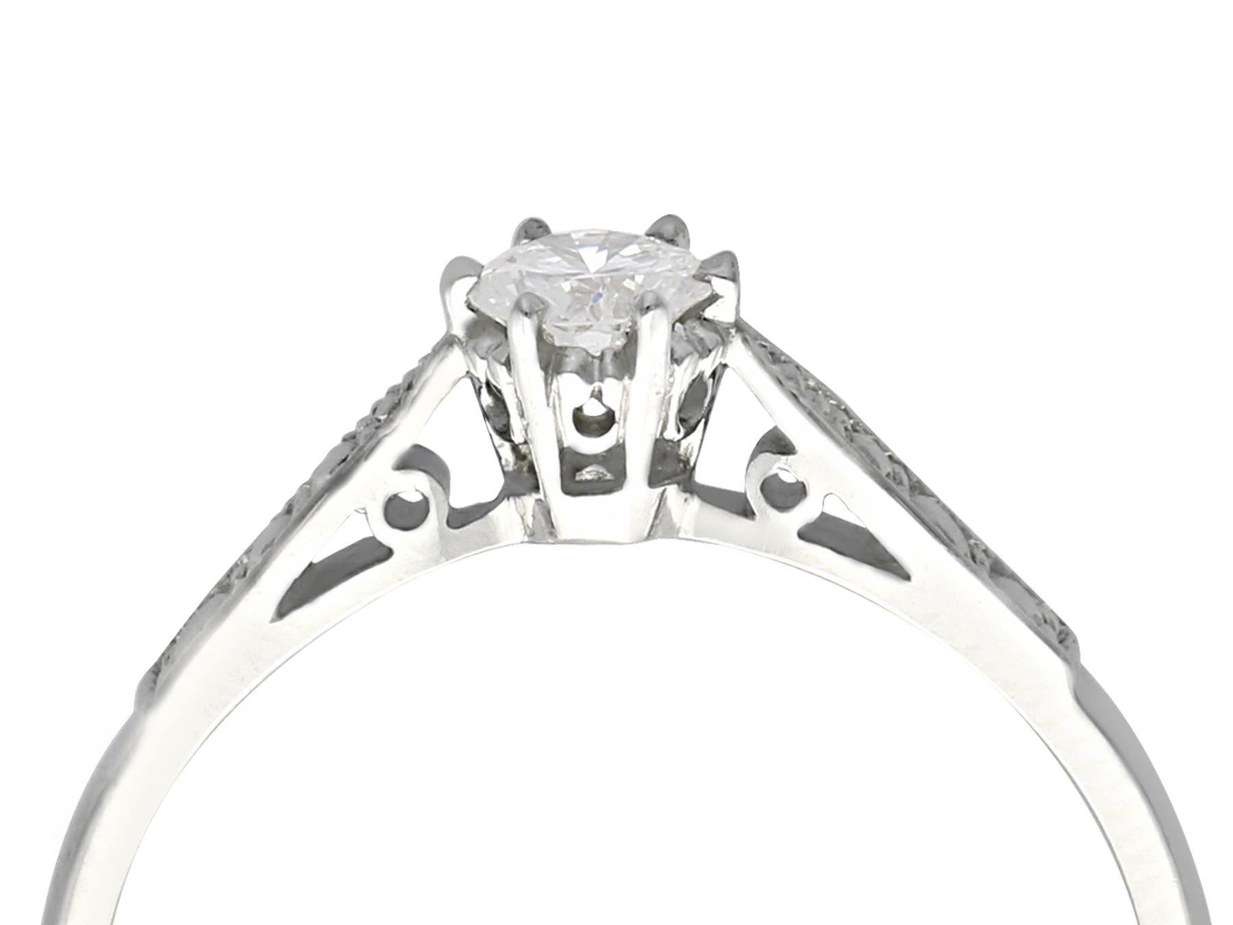 Contemporary Diamond and Platinum Solitaire Engagement Ring For Sale