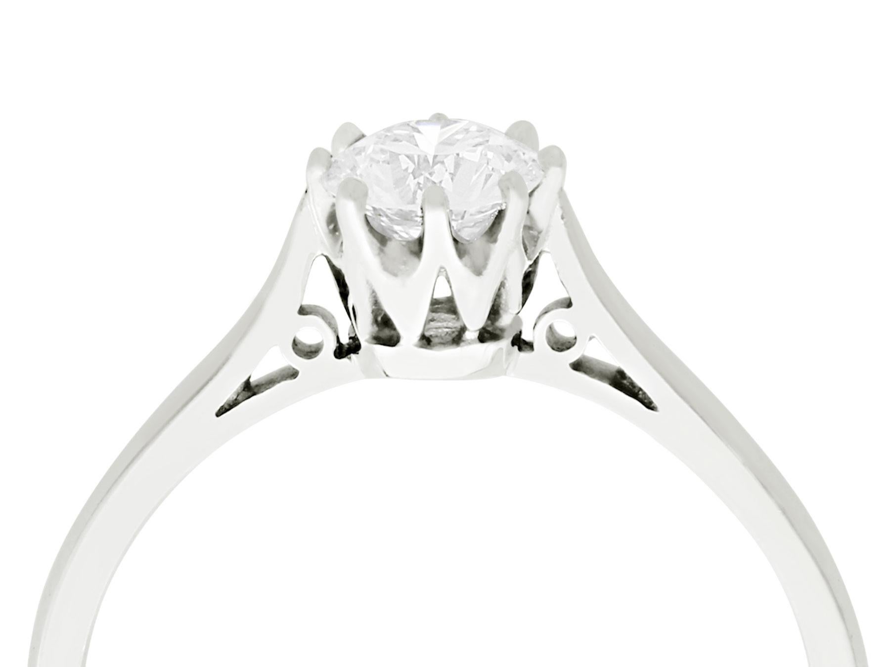 A fine and impressive vintage 0.57 carat diamond solitaire displayed in a contemporary platinum setting; part of our diamond jewelry/estate jewelry collections

This impressive vintage solitaire is displayed in a contemporary platinum setting.

The