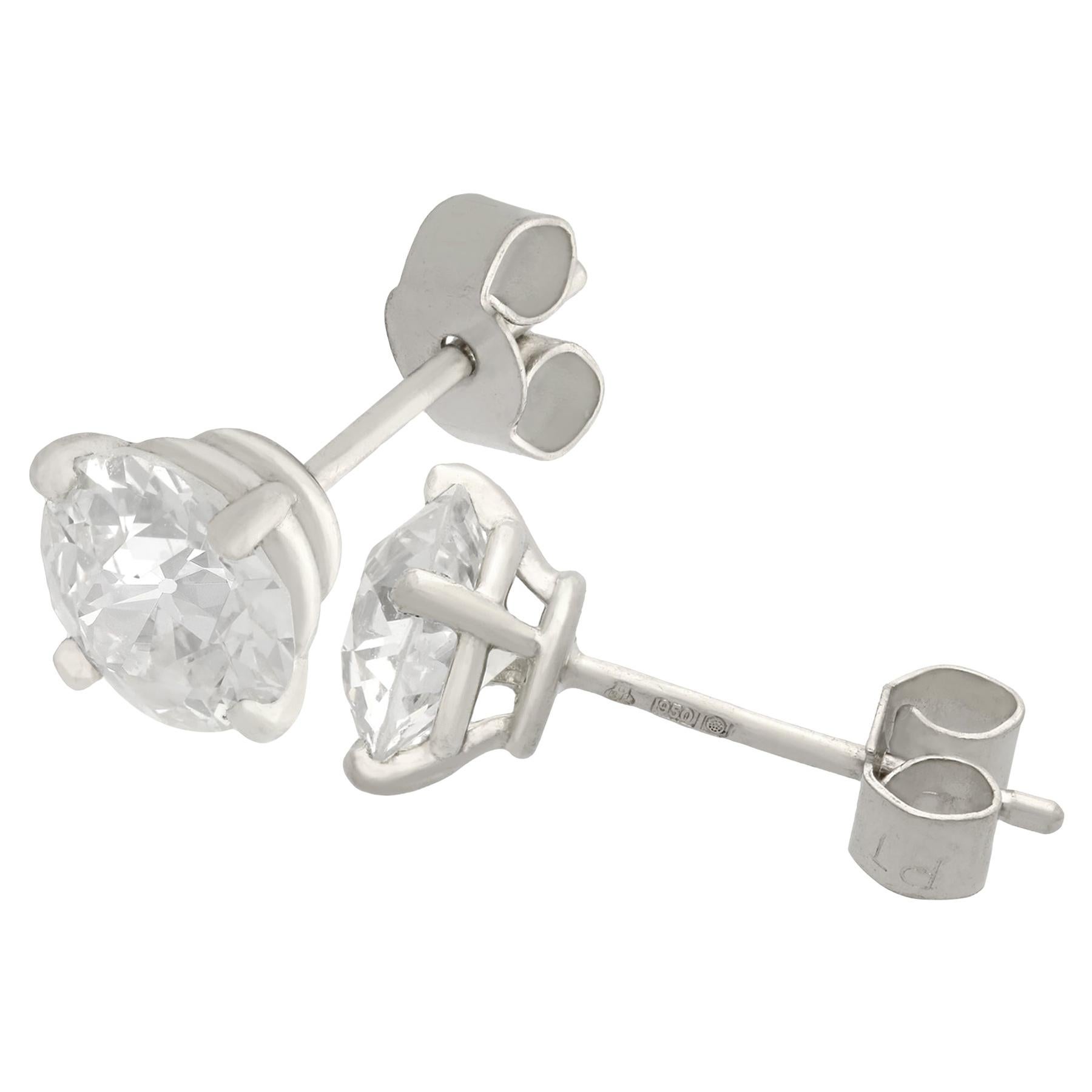A stunning pair of vintage and contemporary 0.92 carat diamond and platinum stud earrings; part of our diverse diamond jewelry and estate jewelry collections.

These stunning, fine and impressive diamond stud earrings have been crafted in