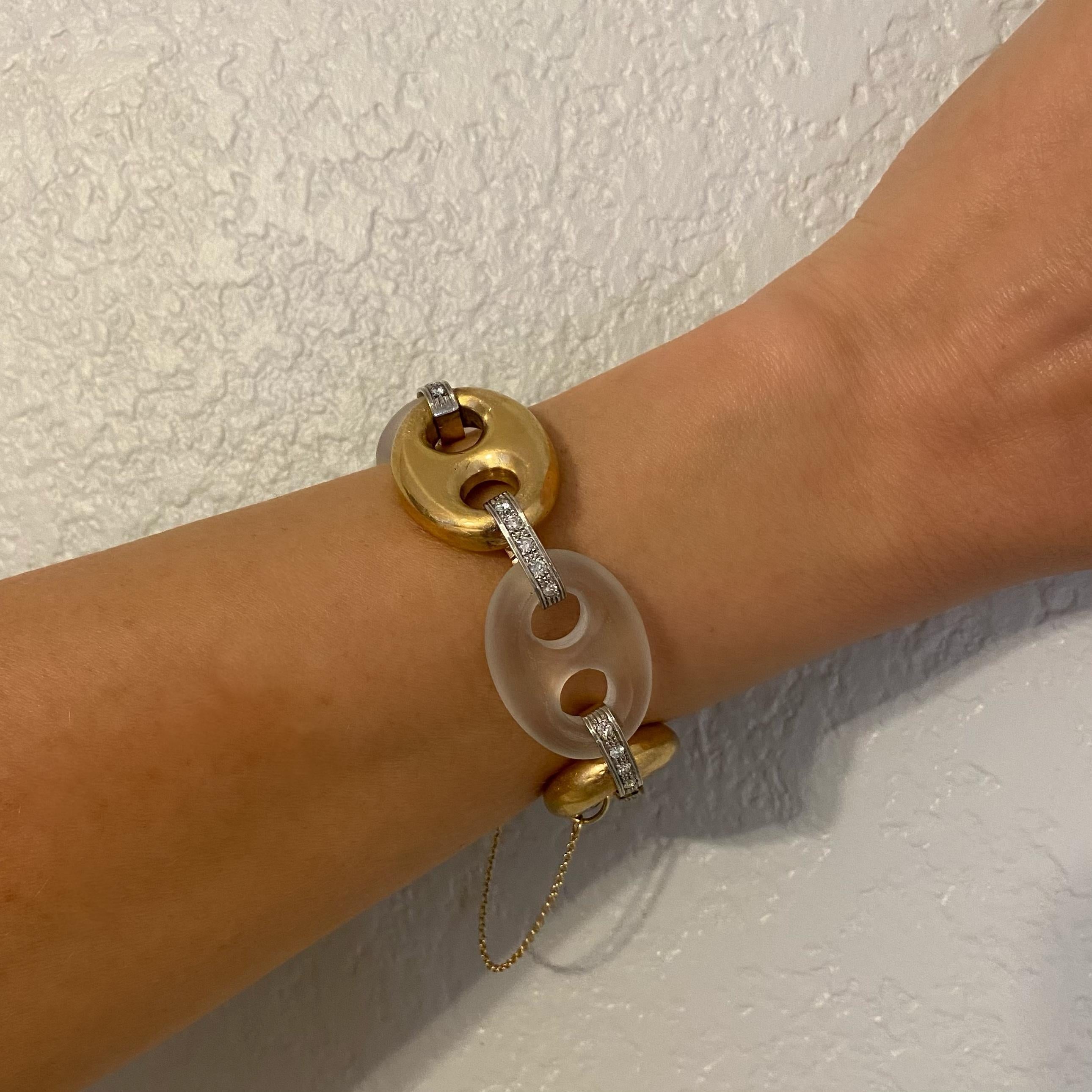 Beautiful Chunky Gold Bracelet Hand crafted with alternate Open Links in 18K Gold and Quartz Crystal with Diamond spacers set with 30 round Brilliant cut Diamonds approx. 1.50tcw. Bracelet measures approx. 7.5 long. Hand set and Hand crafted in 18K