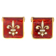 Boucles d'oreilles Fleur de Lys en diamant et émail rouge