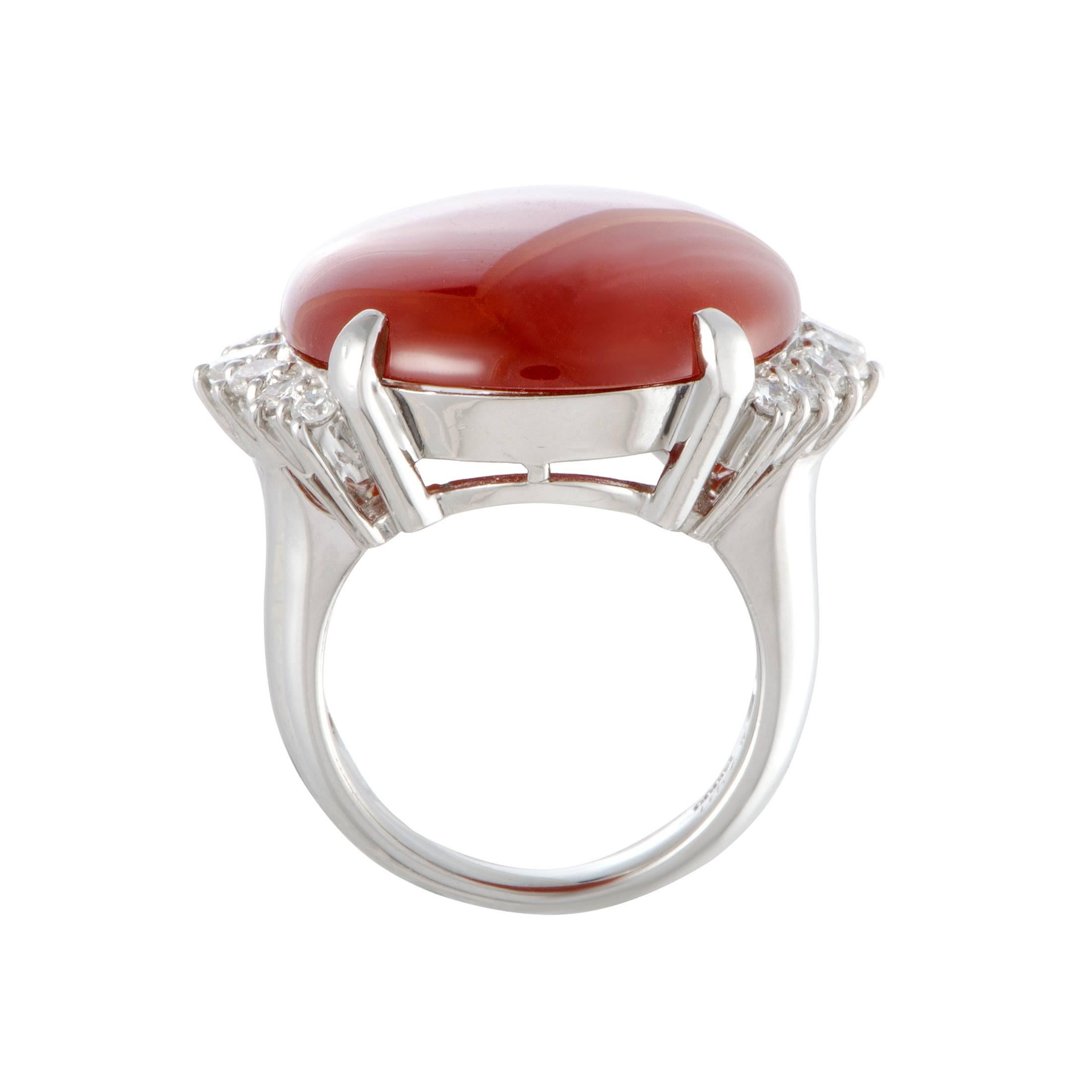 The eye-catching red jade adds a nice touch of color to this marvelously designed ring that is expertly crafted from luxurious platinum. The ring is also set with 0.90 carats of diamond stones, while the jade weighs 27.91 carats.
Ring Size: