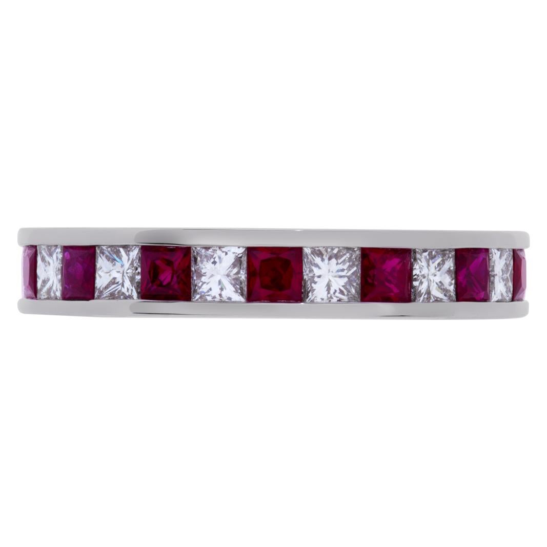Diamond and ruby princess cut eternity band in 18k white gold, with 1.32 carats in diamonds and 1.79 carats in rubies. Size 7  This Eternity Band ring is currently size 7 and some items can be sized up or down, please ask! It weighs 3.2 pennyweights