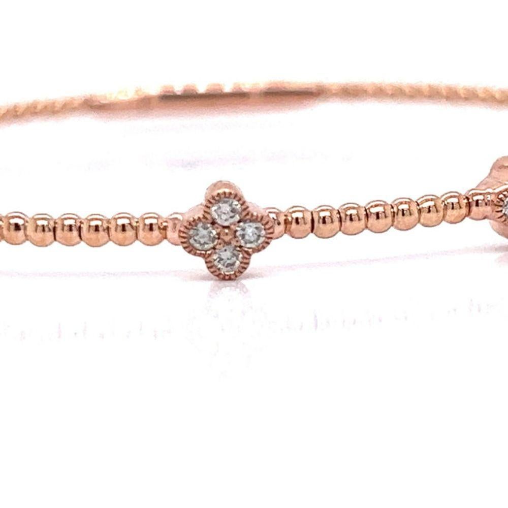 Diamond and Rose Gold Clover Bracelet

Fun and flexible! Great to stack

Additional Information:
Metal Type : 14K Rose Gold
Metal Weight : 6.15 gram
Measurement : 6.75 inches
Side Stone 1 : 
Stone Type : Diamond
Shape : Round
Stone Weight : 0.45