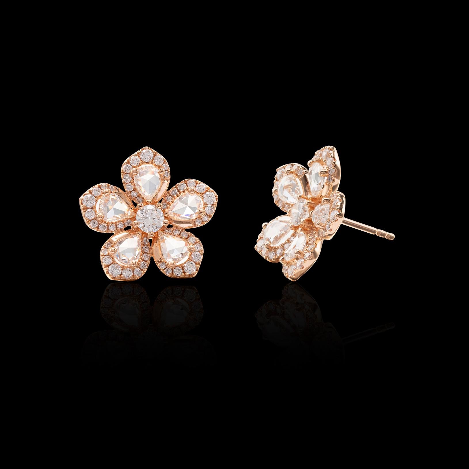 Sweet and feminine, these 18k rose gold earrings by are full of floral charm! Designed as five-petal flowers, each set with a rose-cut pear-shaped diamond, then accented by round brilliant-cut diamond, totaling 2.09 carats, The stud earrings weight